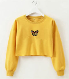 Yellow sweatshirt with a butterfly design on a white background