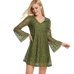 Woman wearing a green lace dress on a white background