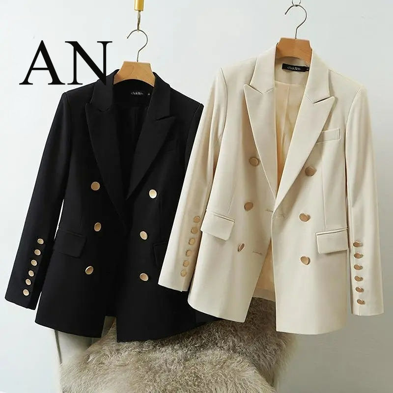 Black and white blazers on hangers with 'AN' branding.