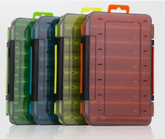 Set of transparent fishing tackle boxes in various colors on a white background