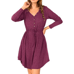 Purple dress with long sleeves on a white background