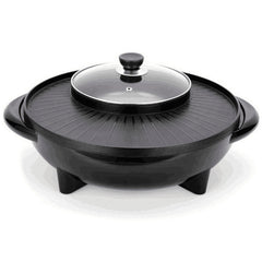 Black electric skillet with glass lid on a white background