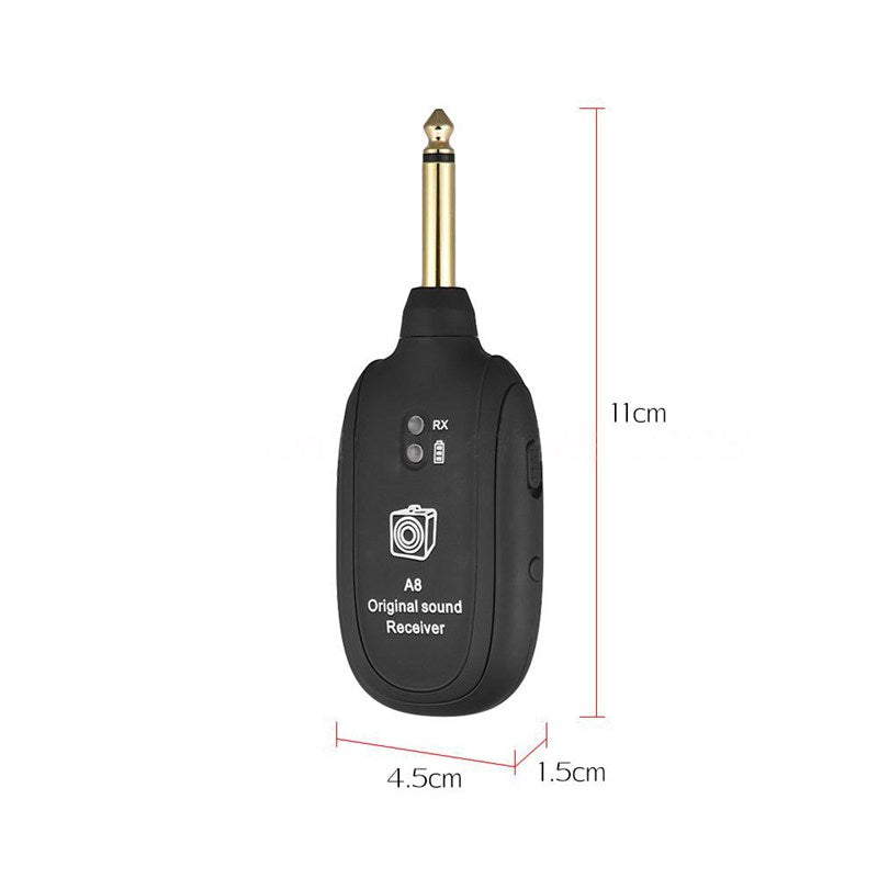Black wireless guitar receiver with measurements on a white background