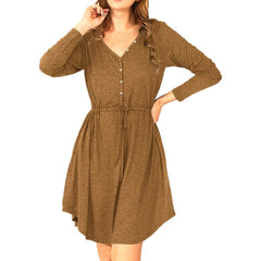 Brown dress worn by a model on a white background