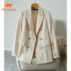 Beige blazer on a hanger against a neutral background