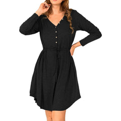 Black dress with long sleeves on a white background