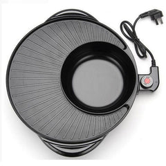 Black electric heating pot with power cord on a white background