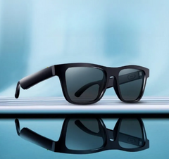 Black sunglasses with a reflective surface on a blue gradient background